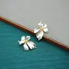 Pendientes de Flor Personalizados de Nicho, Pendientes de Lujo Ligero y de Gama Alta para Mujer, Pendientes de Flor de Espejo Retro Plateados Transfronterizos Europeos y Americanos
