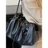 Directo del fabricante: Bolso tipo cubo de moda de gran capacidad para mujer, nueva versión coreana de tendencia 2026, bolso de hombro versátil vintage