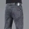 Jeans para Hombre 2024 Primavera y Otoño Nuevos Ajuste Delgado Cónicos Modernos Jóvenes y de Edad Media Pantalones Casuales Grises para Hombre Verano Delgado
