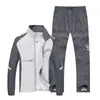 Traje deportivo para pareja de primavera y otoño transfronterizo, ropa deportiva para correr, ropa de exterior informal para hombre, talla grande, abrigo de manga larga, conjunto de ropa