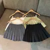 Ropa Infantil Primavera y Otoño 2026 Falda Blanca Plisada de Corte A de Cintura Alta con un Diseño Elegante para Niñas, Falda Corta para Niñas de 6 Años