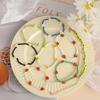 Pulseira trançada à mão colorida de contas de arroz transfronteiriça europeia e americana estilo boho para férias na praia Pulseira de Margarida para mulheres