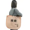 Bolsa No Tejida Logo Impreso Personalizado Bolsa para Ropa Bandolera Tienda de Ropa para Mujer Ecológica Cordón Hebilla Oculta Bolsa de Empaque