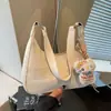 Bolso de mano coreano para el trabajo, nuevo, primavera 2026, transfronterizo, gran capacidad, nicho, moda, versátil, de hombro, cruzado, tipo albóndiga