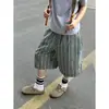 Pantalones cortos de cuadros azules y verdes para hombre y mujer, verano 2026, retro americano casual, corte holgado, versátiles.