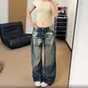 Jeans retro americanos tipo guadaña para mujer, nuevo estilo otoño 2026, pantalones populares de venta caliente, pantalones de pierna ancha tipo guadaña