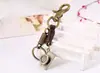 Chaveiro popular europeu e americano masculino vintage de couro de boi pingente de decoração de câmera de liga pingente para mochila de meninas