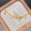 Pulseira de sino de estrelas douradas francesa antiga combinação feminina versátil temperamento de luxo leve loja de ouro explosões corrente de pulso que não desbota