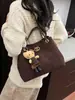 Bolso de Cadena de Moda y Sencillo para Mujer Otoño e Invierno 2025 Nuevo Bolso Cruzado de Hombro Casual Bolso Cubo de Moda para el Trabajo