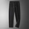 Pantalones deportivos de alta gama elásticos para hombre para primavera y otoño, talla grande, estilo de negocios, gruesos, resistentes a las arrugas, holgados, de pierna recta, joggers informales