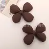 Rústico, Simple y Versátil Tela Color Sólido Relleno de Algodón Accesorios de Lazo DIY Accesorios para el Cabello Broches para Ropa Accesorios Venta al por Mayor