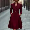 2026 Dropshipping de comercio exterior transfronterizo europeo y americano: Vestido de color liso, cintura ajustada, cuello en V, manga larga, falda acampanada, vestido de otoño para mujer