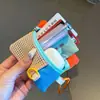Nuevo cordón de teléfono colorido, charm para bolso, caja de sobre rojo, accesorio para teléfono, llavero, bolsa versátil para auriculares, colgante de bolso pequeño