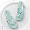 Zapatillas de masaje con flores, zapatos de mujer, chanclas de verano nuevas, sandalias de playa planas de color sólido a la moda para mujer, venta al por mayor de marea