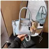 Tendência de Moda Nova Primavera 2026 Bolsa de Ombro Feminina Bolsa de Mão Casual Simples Grande Capacidade Bolsa Transversal