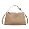 Nuevo bolso de hombro retro de gamuza 2026 para mujer, un bolso tipo almohada para la axila elegante y versátil, perfecto para ir al trabajo y se puede llevar como bolso de mano o cruzado