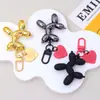 Estilo Ins Perro Globo Color Caramelo Colgante Llavero Metal Amor Estuche para Auriculares Colgante de Bolso Accesorios para Pareja