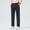 Produto em destaque da Roupa Masculina Xintang: Calças Casuais Masculinas Levemente Luxuosas de Primavera/Verão, Soltas, de Perna Reta, Slim Fit, Business Casual