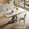 Mesa de Comedor Minimalista Italiana de Piedra Sinterizada Mesa Superior Brillante de Alta Gama de Piedra Sinterizada Soporte Metálico Hueco Celebridad de Internet Juego Completo de Mesa y Sillas para Restaurante