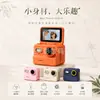 2026 Nuevo Llegada M1 Pantalla Giratoria Mini Cámara Digital de Bolsillo para Dedos Infantil CCD HD Disparo Flash