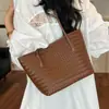 Bolso de mujer de gran capacidad 2026 nuevo verano vintage de alta gama lujo ligero bolso de hombro bolso cubo tote para ir al trabajo