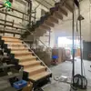 Escalera de tijera en forma de U casual produce quilla de estructura de acero dentada personalizada peldaño de madera de haya placa de sellado inferior con LED LED