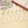 Estilo Pequeño Aroma Transfronterizo Nuevo Colgante de Llavero con Cadena de Perlas Mini Estrella de Cinco Puntas Accesorios de Cadena para Colgar en Funda de Teléfono Móvil Bolso para Mujeres