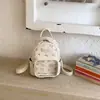 Mochila de Moda Fresca Elegante de Dibujos Animados 2026 para Mujeres, Bolso de Mano Pequeño Versátil Texturizado de Diseño de Nicho