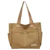 Bolsa de Lienzo Estética de Alto Valor para Mujer, Gran Capacidad, Bolso de Hombro para Estudiante, Bolso de Mano Portátil, Nuevo Estilo de Moda Primavera/Verano 2026