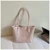 2026 Nova Bolsa Tote Elegante Simples Vazada Transfronteiriça, Bolsa de Ombro Casual Versátil para Mulheres, Bolsa Feminina de Grande Capacidade