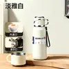 2026 Nova Caneca Térmica de Aço Inoxidável Grande Capacidade Tampa de Aço Design Simples Alta Aparência para Meninas Portátil de Mão Separador de Chá e Água