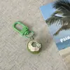 Llavero de coco, juguete de comida simulada, colgante de coco verde, accesorio de bolsa de recuerdo navideño, accesorio divertido, regalo al por mayor