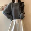 Suéter macio e aconchegante com gola redonda para mulheres, novo estilo outono e inverno, corte casual solto, pulôver emagrecedor, top de tricô curto de manga longa para mulheres