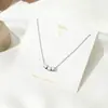 Collar de amor sencillo de estilo japonés y coreano, cadena de clavícula con astas cruzadas, flor, perla y colgante de latido de corazón de celebridad cibernética.