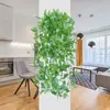 Colgante de pared de planta verde artificial Amazon transfronterizo decoración del hogar planta verde falsa pothos adorno de hoja de vid planta artificial