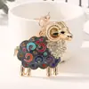 Nuevo llavero de oveja con diamantes y diseño de goteo de aceite, diseño de oveja del zodiaco chino, colgante para bolso de mujer, llavero de coche, regalo pequeño