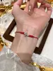 Pulsera de Hilo Rojo Francés Azul Marino en Forma de Cruz para Mujer, Joyería de Lujo Ligero de Alta Gama, Joyería de Pulsera Tejida al por Mayor para Parejas