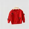 Conjunto de estilo coreano para niña 2026 nuevo modelo cárdigan de punto de cereza infantil y pantalones casuales de lana conjunto de dos piezas para primavera y otoño