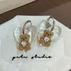 Novo design de nicho estilo coreano versátil único colar com pingente de urso transparente em formato de coração corrente de suéter simples retrô para mulheres