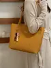 Nova bolsa de ombro feminina de comércio exterior transfronteiriço, bolsa de mão feminina de trama de grande capacidade, bolsa de trabalho versátil, simples e moderna