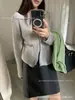 Nuevo cárdigan de punto casual de estilo coreano para mujer de principios de otoño, holgado, de un solo botón, con cuello de solapa y diseño calado