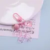 Dopamina Transparente Hueco Flor de Cinco Pétalos Oso Llavero DIY Decoración de Bolso Hecha a Mano Accesorio Pequeño