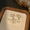 Pendientes de Plata de Ley S925 con Aguja Coreana de Lazo Simple y Perla Lujo Accesible Diseño de Nicho de Gama Alta Pendientes para Mujer