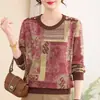 Otoño 2026 Nuevo Estilo Estampado Retro Cuello Redondo Tejido para Madres de Mediana Edad y Mayores Estilo Holgado que Cubre el Vientre Adelgazante Elegante Estilo que Reduce la Edad