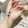 Versa Lujo retro francés Grupo Esmeralda incrustado circonio pulsera de alta gama estilo antiguo vintage pulsera rosa