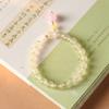 Pulsera Caifu de Calcedonia Amarilla Fresca Artística Estilo Hada Dulce Diseño de Nicho Femenino Colgante de Pieza de Raíz de Loto Pulsera Rosa