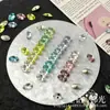 Wuzhou K9 súper brillantes 6x10 diamantes de imitación con forma de huevo de paloma 1:1 réplica de accesorios de uñas decorativas Huazi de fondo puntiagudo DIY