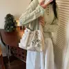 Bolsas de Mano Pequeñas Populares de Moda para Mujer 2026 Nuevo Bolso Cruzado Exquisito Versátil Bolso de Hombro Tipo Cubo Simple a la Moda