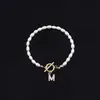 2025 Moda Nueva Transfronteriza Pulsera de Letras Inglesas Cobre Incrustado Circonita Oval Perla de Imitación Pulsera de Perlas al por Mayor
