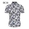 2023 Comercio Exterior Transfronterizo Nueva Camisa de Manga Corta para Hombre Estilo Coreano Moda Juvenil Casual Camisa Estampada para Hombre